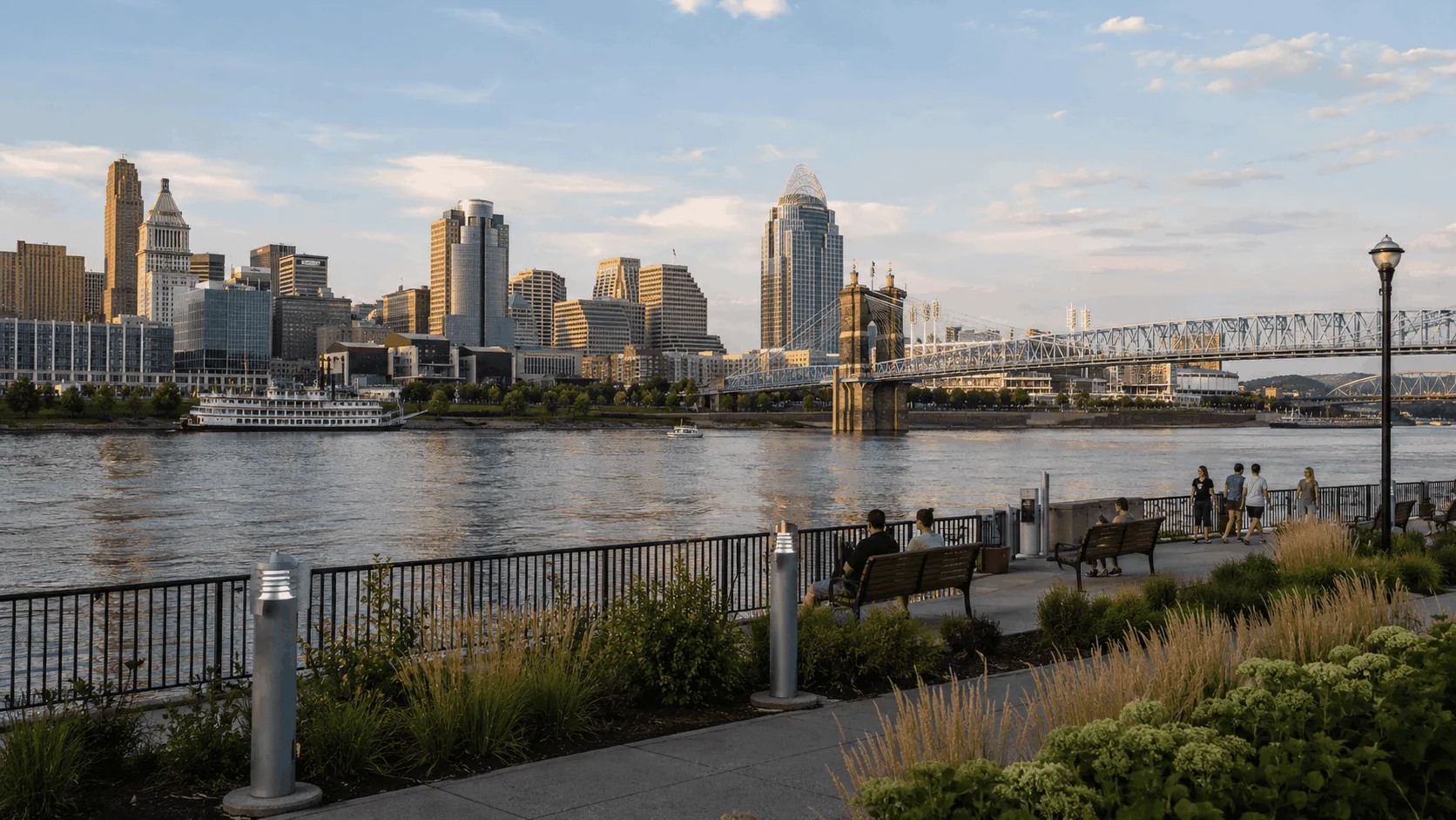 Riverside promenade at sunset with skyline at Newport